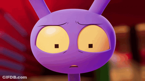 A Close Up Of A Purple Cartoon Character Making A Funny Face GIF
