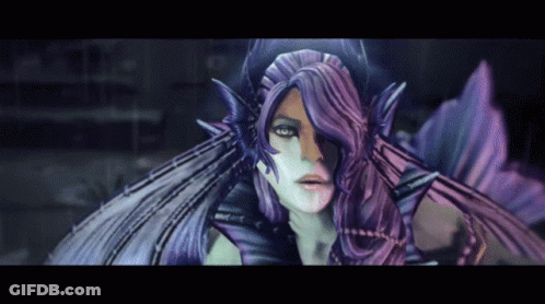 A Close Up Of A Purple Haired Woman With Wings GIF