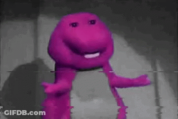 A Close Up Of A Purple Stuffed Animal With A Purple Face . GIF