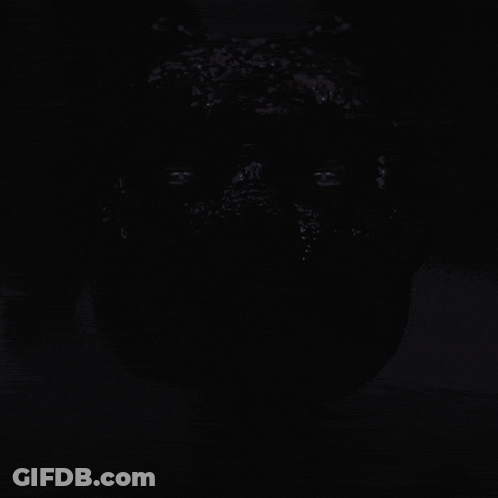 A Close Up Of A Rabbit 'S Face With A Purple Background GIF