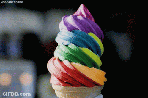 A Close Up Of A Rainbow Colored Ice Cream Cone With The Caption Who Can Find Me GIF