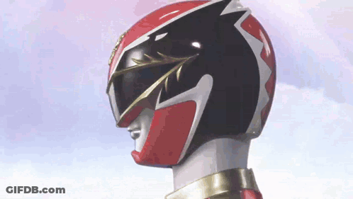 A Close Up Of A Red And Black Power Ranger 'S Helmet . GIF