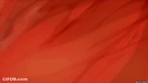 A Close Up Of A Red And White Striped Fabric GIF