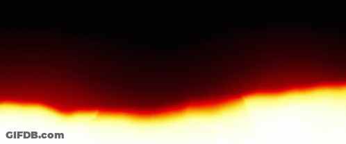 A Close Up Of A Red And Yellow Flame On A Black Background . GIF