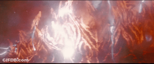 A Close Up Of A Red Background With A Glowing Light In The Middle GIF