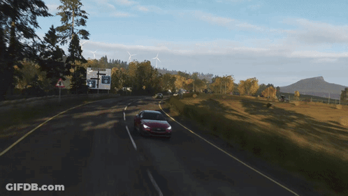 A Close Up Of A Red Car 'S Tail Light That Says ' J ' On It GIF