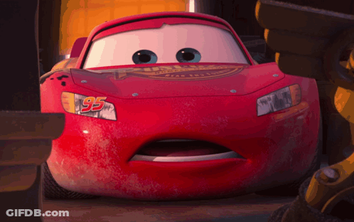 A Close Up Of A Red Car With The Number 95 On The Front GIF
