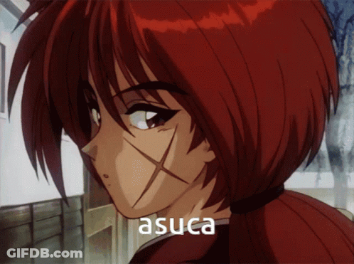 A Close Up Of A Red Haired Anime Character With The Name Asuca Written On The Bottom GIF