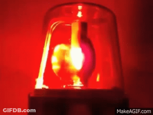 A Close Up Of A Red Light That Looks Like A Heart On Make A Gif . GIF