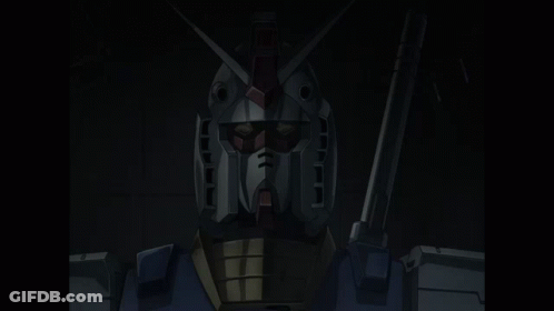 A Close Up Of A Robot 'S Face With Red Eyes And A Gun GIF
