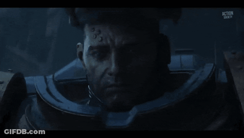 A Close Up Of A Robot 'S Face With Red Eyes And The Words Action Gear On The Bottom GIF