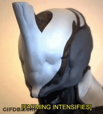 A Close Up Of A Robot 'S Head With The Words `` Farming Intensifies '' Written Below It . GIF
