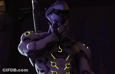 A Close Up Of A Robot With A Green Light On His Face . GIF