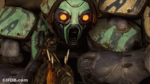 A Close Up Of A Robot With A Mask That Says ' A2m ' On It GIF