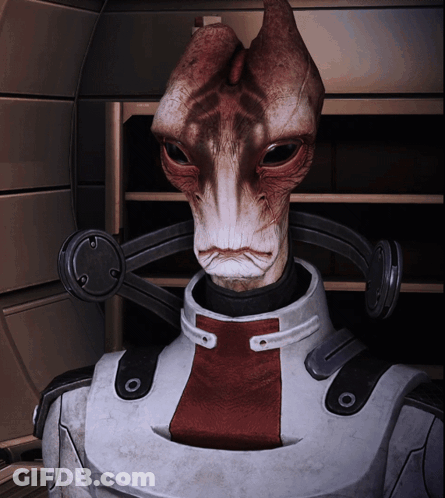 A Close Up Of A Robot With A Red And White Stripe On His Chest GIF