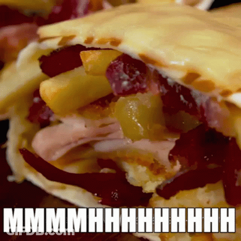 A Close Up Of A Sandwich With A Caption That Says Mmmmhhhhhhh GIF
