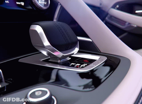 A Close Up Of A Shifter In A Car With The Word Max On The Bottom GIF