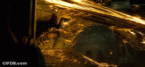 A Close Up Of A Shiny Object With A Blurred Background GIF