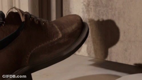 A Close Up Of A Shoe 'S Sole On A Concrete Surface GIF