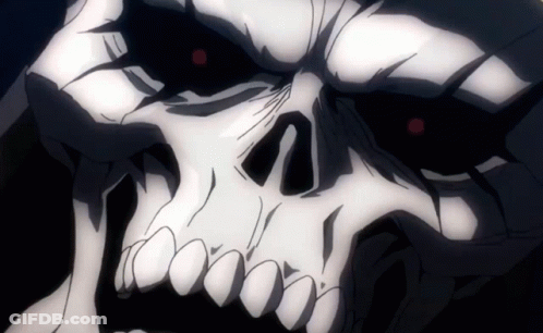 A Close Up Of A Skeleton 'S Face With Red Eyes GIF