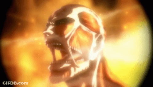 A Close Up Of A Skeleton With Its Mouth Open And Fire Behind It . GIF