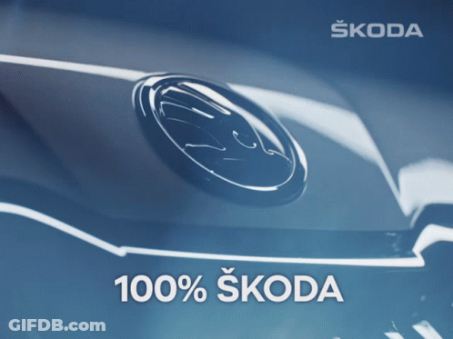 A Close Up Of A Skoda Logo With 100 % Skoda Written Below It GIF