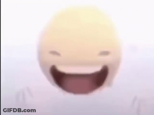 A Close Up Of A Smiley Face With Its Mouth Open And Tongue Out . GIF