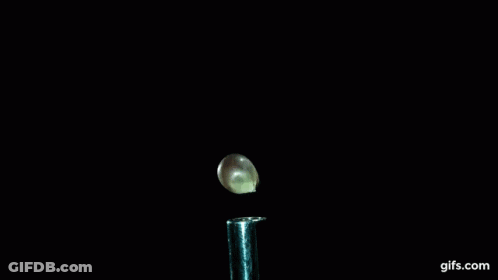 A Close Up Of A Smoke Coming Out Of A Test Tube With Gifs.com Written On The Bottom GIF