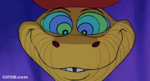 A Close Up Of A Snake 'S Face With Hypnotic Eyes GIF