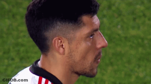 A Close Up Of A Soccer Player 'S Face On A Field GIF