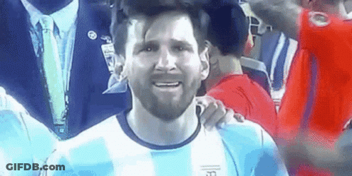 A Close Up Of A Soccer Player 'S Face With His Arm Around Another Man 'S Shoulder . GIF