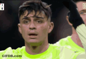 A Close Up Of A Soccer Player 'S Face With The Score 1 To 0 GIF