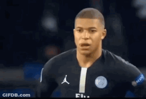 A Close Up Of A Soccer Player Wearing A Black Jersey With A White Stripe . GIF