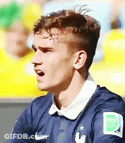 A Close Up Of A Soccer Player Wearing A Blue Jersey With The Letter D On It GIF