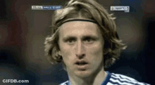 A Close Up Of A Soccer Player Wearing A Headband And Looking At The Camera . GIF