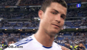 A Close Up Of A Soccer Player Wearing A White Shirt With Blue Stripes . GIF