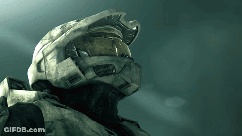 A Close Up Of A Soldier 'S Helmet With A Yellow Visor GIF