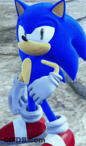 A Close Up Of A Sonic The Hedgehog Standing On The Ground GIF