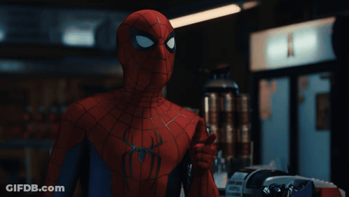 A Close Up Of A Spider Man Giving A Thumbs Up Sign GIF