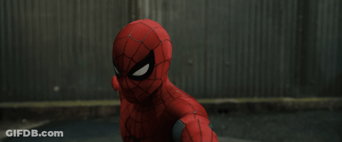 A Close Up Of A Spider Man In A Red Suit GIF