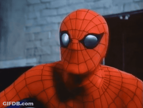 A Close Up Of A Spider Man 'S Face And Eyes GIF