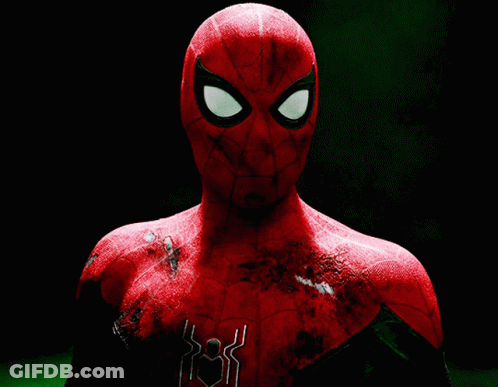 A Close Up Of A Spider Man 'S Face With A Black Background GIF
