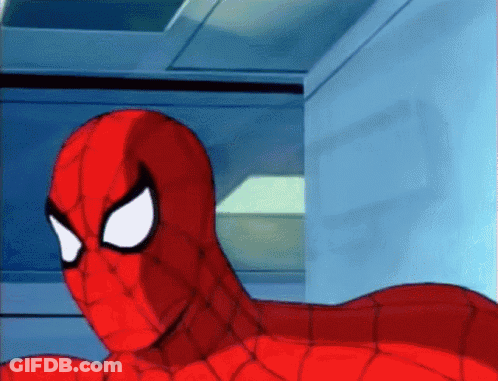 A Close Up Of A Spider Man 'S Face With A Blue Background GIF