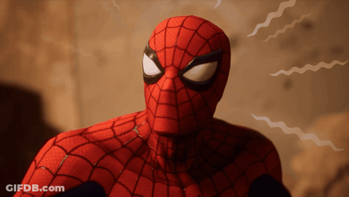 A Close Up Of A Spider Man 'S Face With A Spider Web On It GIF
