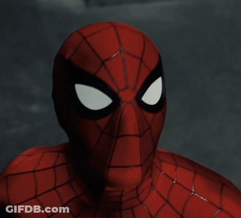 A Close Up Of A Spider Man 'S Face With Black Eyes GIF
