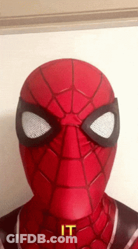 A Close Up Of A Spider Man 'S Face With The Word " It " On It GIF