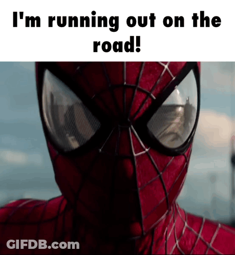 A Close Up Of A Spider Man With The Words " I 'M Running Out On The Road " Above Him GIF