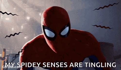 A Close Up Of A Spider Man With The Words " My Spidey Senses Are Tingling " On The Bottom GIF