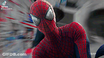 A Close Up Of A Spiderman Costume With A Blurry Background . GIF