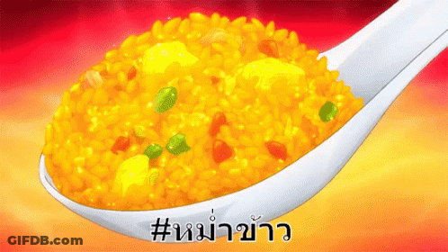 A Close Up Of A Spoon Filled With Yellow Rice And Green Peas GIF